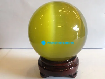 Quả cầu phong thủy đá mắt mèo vàng